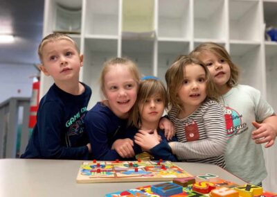 Kids playing a puzzle together