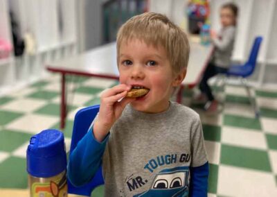 Boy eating at table